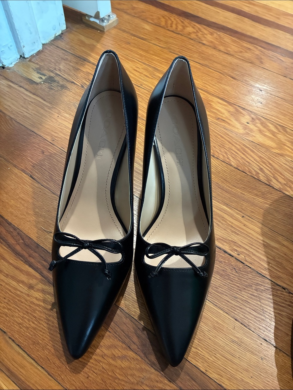 Coach Black Leather Pointed-Toe Pumps with Bow Accent